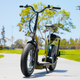 The Razor EcoSmart Cargo parked on a sidewalk and leaning against its kickstand.